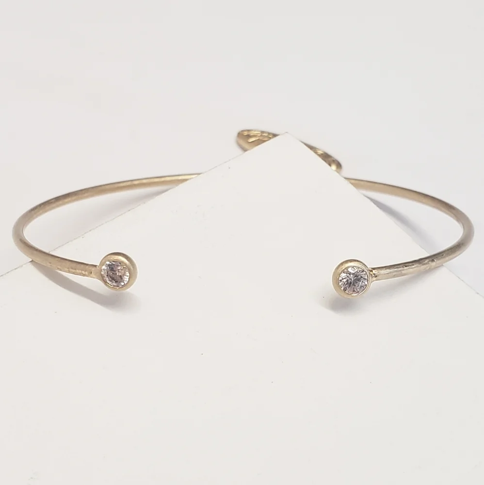 Plunder Gold Tone Crystal End Cuff Bracelet